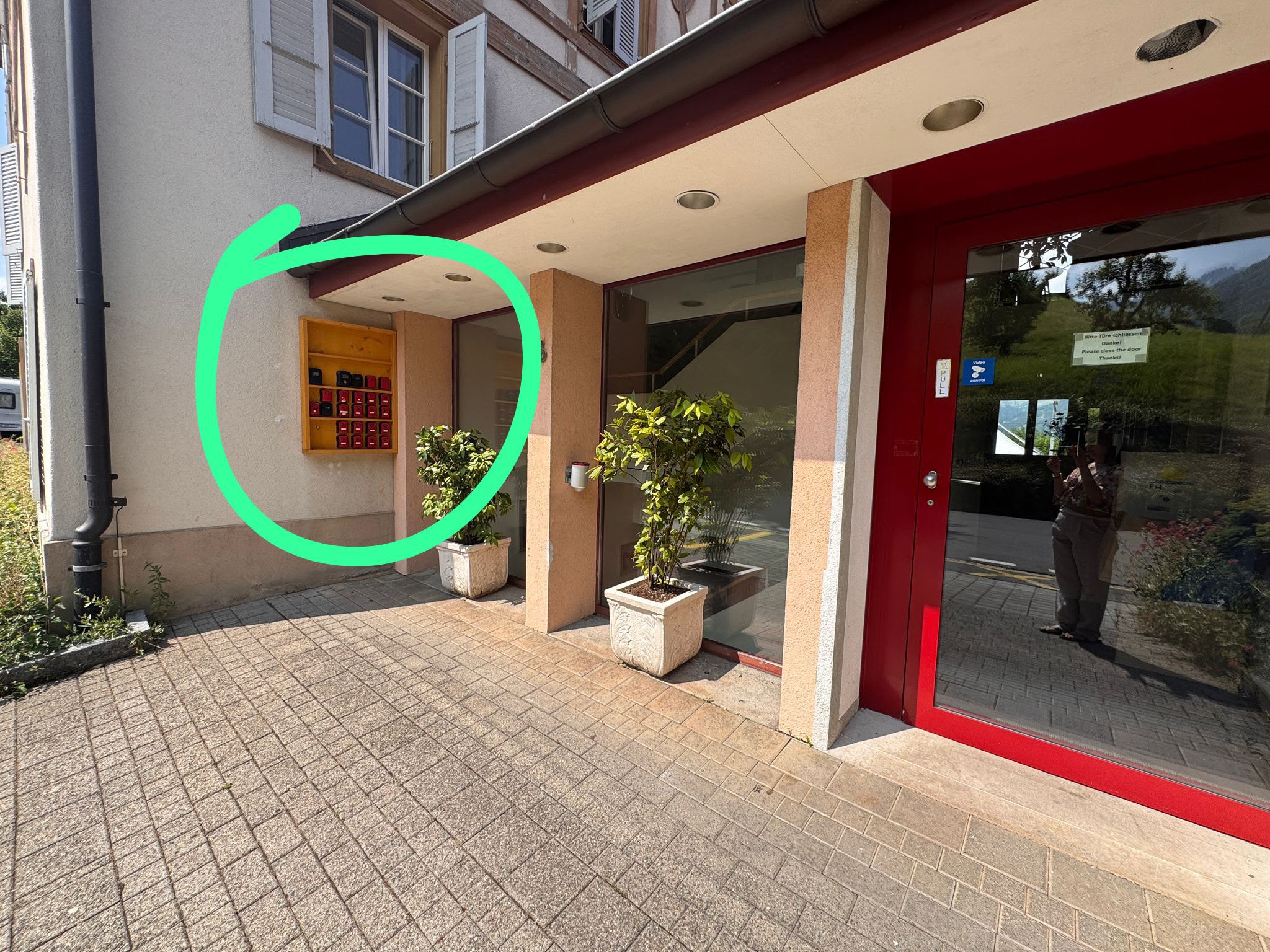Hotel Du Lac entrance with the key box marked beside the door