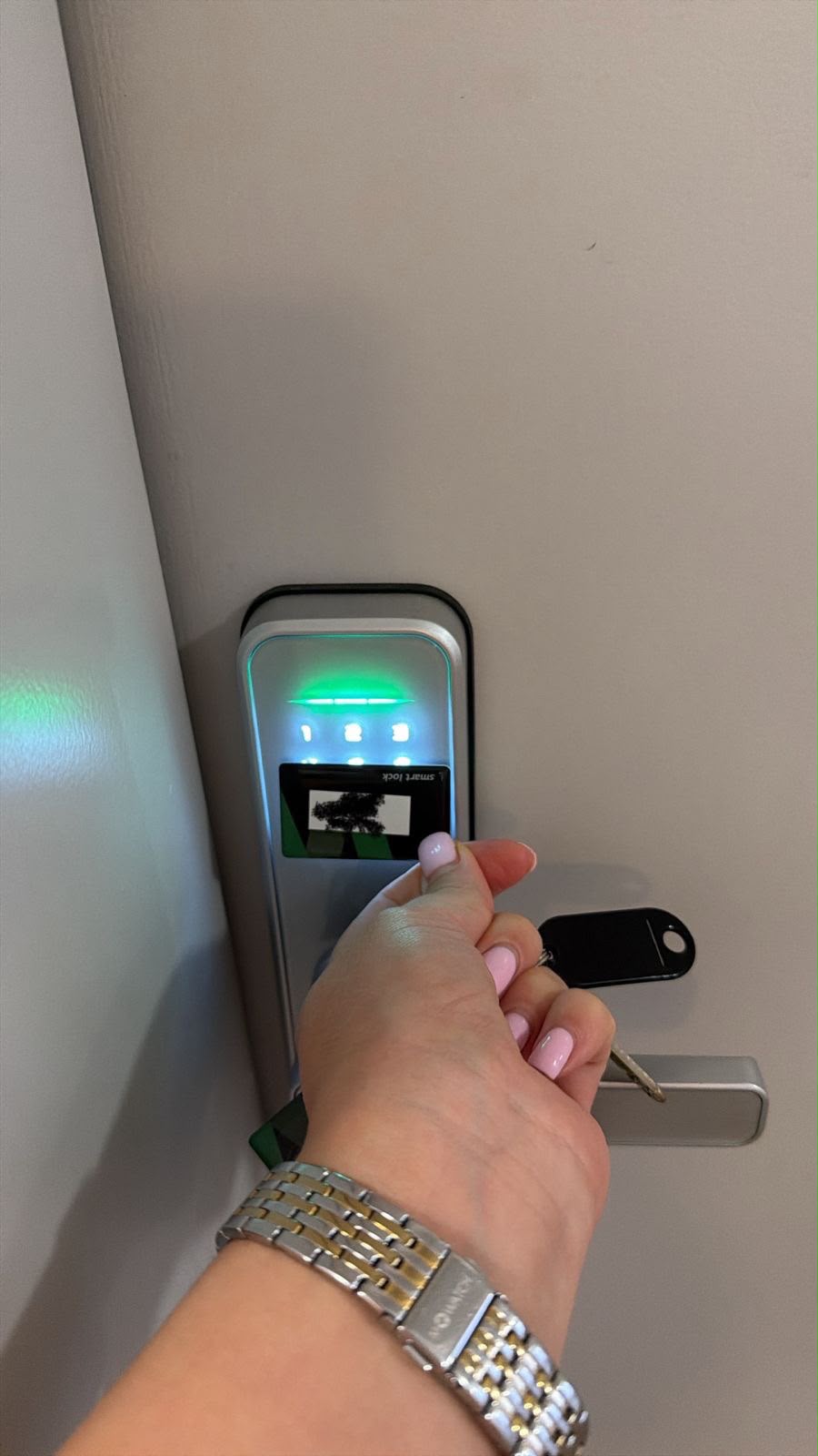 Room door with card reader and room key